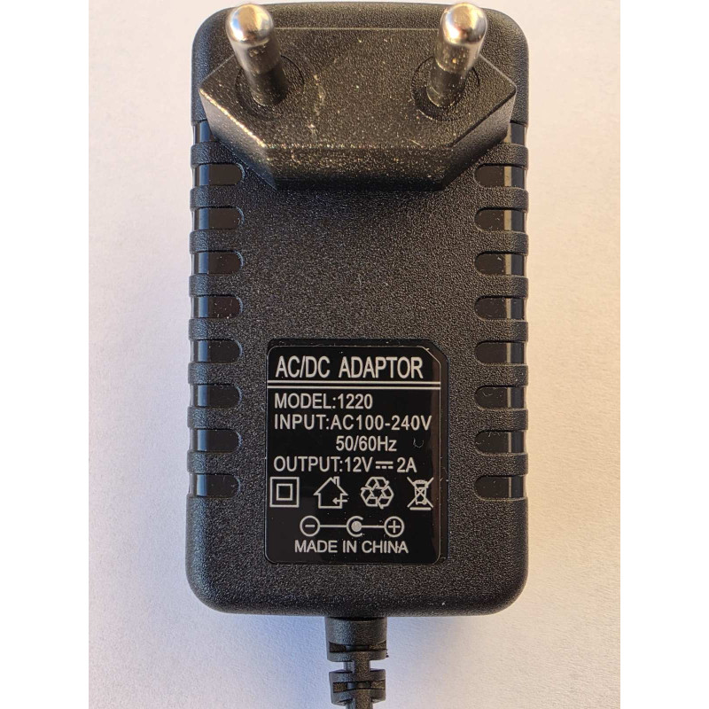 Універсальний адаптер живлення AC/DC 12V 2A для електронних пристроїв